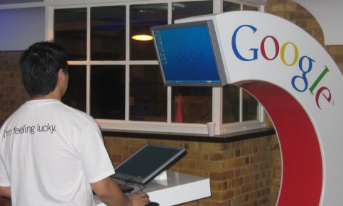 Delegate using laptop station at Google dev day in London